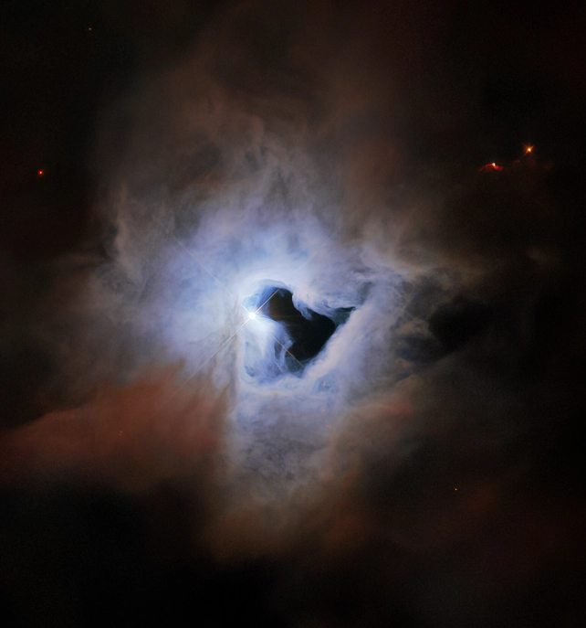 Hubble Uzayın Derinlerinde Ürkütücü Bir 'Kozmik Anahtar Deliği' Buldu